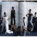 1. An open book displaying a group of women dressed in elegant black dresses, showcasing their diverse styles and poses. 2. A book opened to reveal a group of women in stylish black dresses, highlighting their camaraderie and fashion choices. 3. An open book featuring a collection of women in black dresses, emphasizing their unity and distinct fashion expressions.